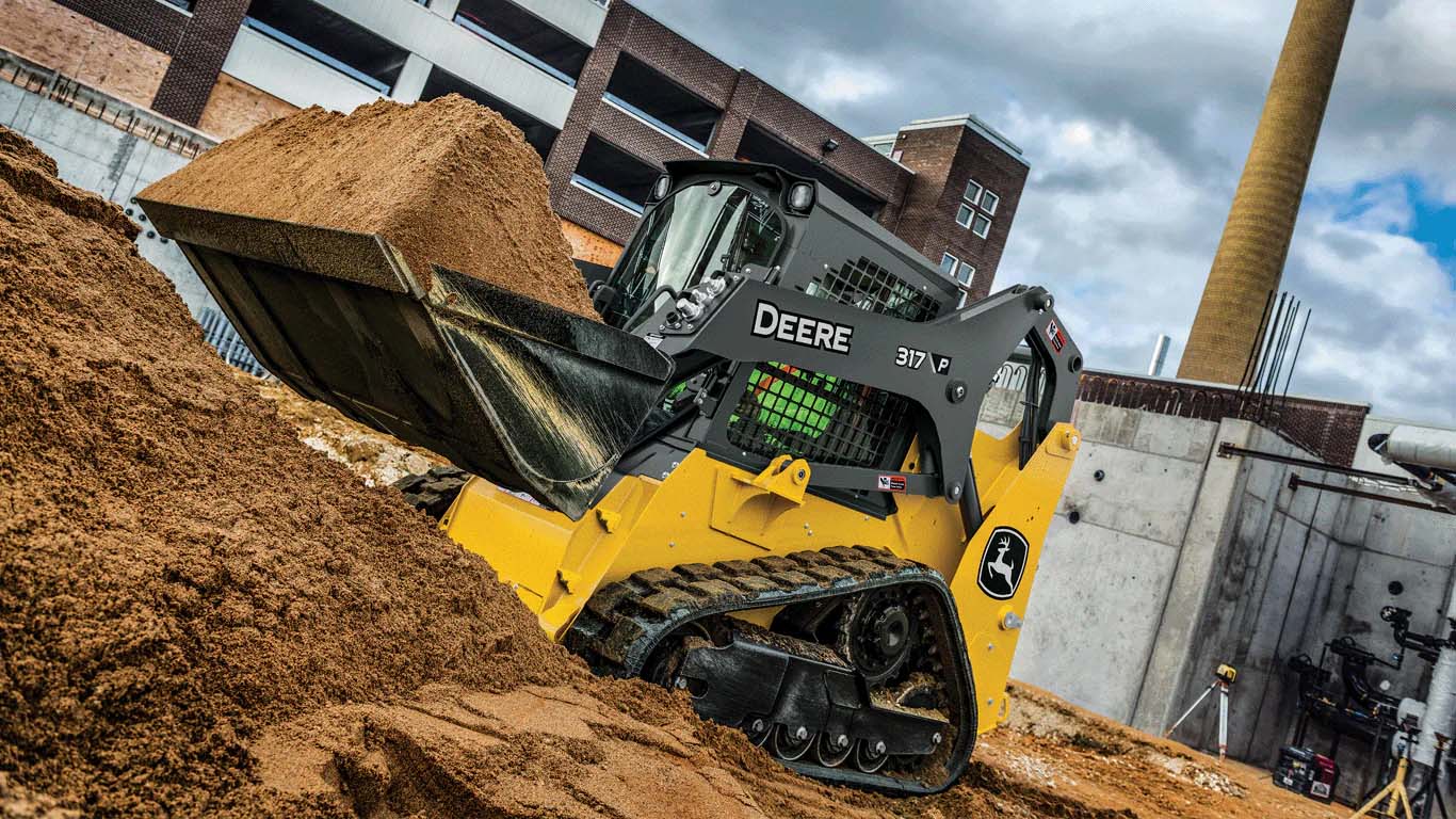 John Deere compact track loader moving dirt