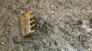 rain & mud safety; excavator buried in mud